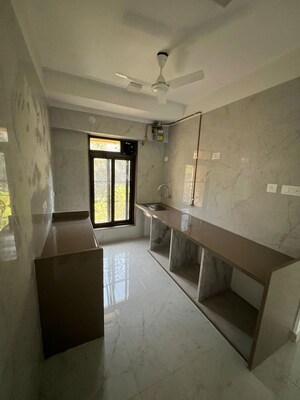 Kitchen in 2 BHK Apartment at JPV Pratap Elegance, Vile Parle West – for Sale