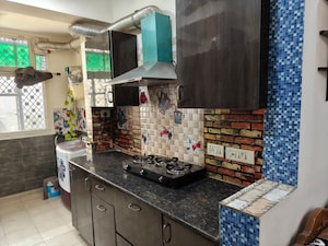 Kitchen in 2 BHK Apartment at Amrapali Silicon City, Sector 76 – for Rent