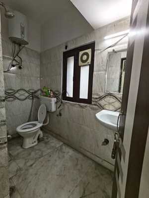 Bathroom in 2 BHK Builder Floor at Malviya Nagar – for Rent