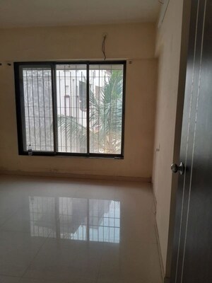 Room in 2 BHK Apartment at Medha CHS, Kandivali West – for Sale