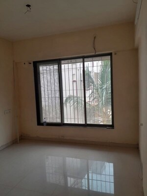 Room in 2 BHK Apartment at Medha CHS, Kandivali West – for Sale