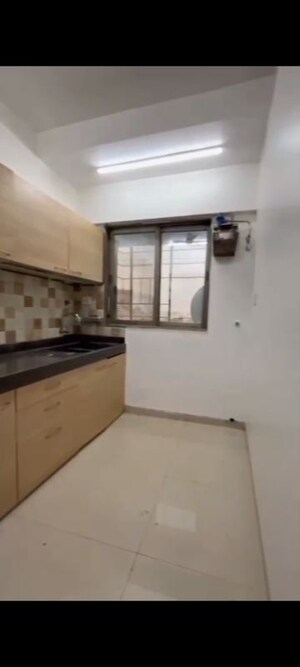 Kitchen in 2 BHK Apartment at Smgk Associates Residency, Jogeshwari West – for Rent
