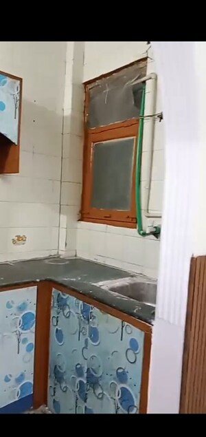 Kitchen in 1 BHK Builder Floor at Mahavir Enclave – for Sale
