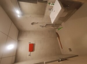 Bathroom in Studio Apartment at Omaxe India Trade Center, Alpha Ii Greater Noida – for Sale