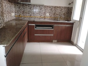 Kitchen in 2 BHK Apartment at Prateek Wisteria, Sector 77 – for Rent