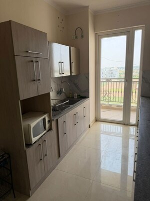 Kitchen in 4 BHK Apartment at Affinity Greens, International Airport Road – for Sale