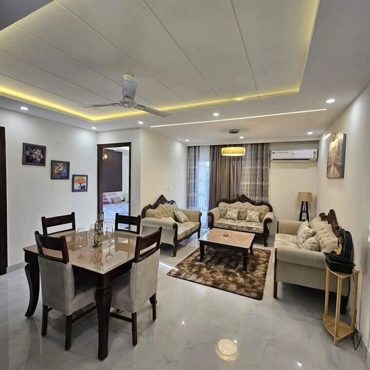 Living Room, maya-green-lotus-saksham 3 Bedroom 1600 Sq.Ft. Apartment In International Airport Road Zirakpur 10515422