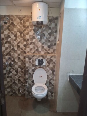 Bathroom in 3 BHK Apartment at Mahagun Moderne, Sector 78 – for Rent