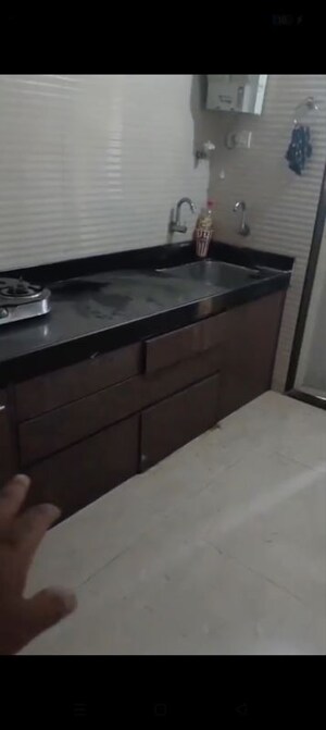 Kitchen in 1 BHK Apartment at Cosmos Jewels Ruby, Ghodbunder Road – for Rent