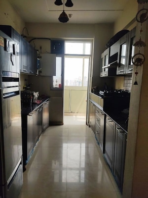 Kitchen in 2 BHK Apartment at Antriksh Golf View, Sector 78 – for Rent