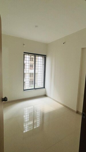 Room in 2 BHK Apartment at Nivasa Enchante, Lohgaon – for Rent