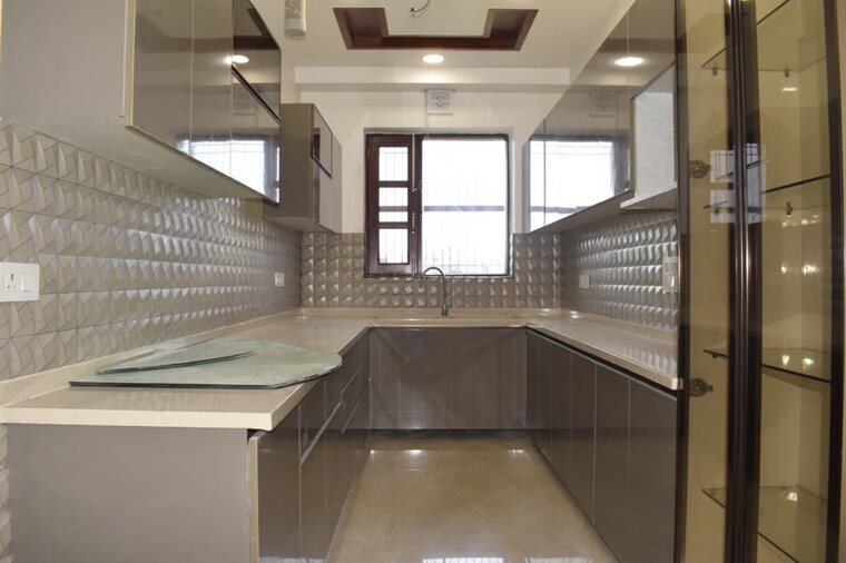 Kitchen, bptp-district-phase-2 3 Bedroom 1557 Sq.Ft. Builder Floor In Sector 84 Faridabad 10515526