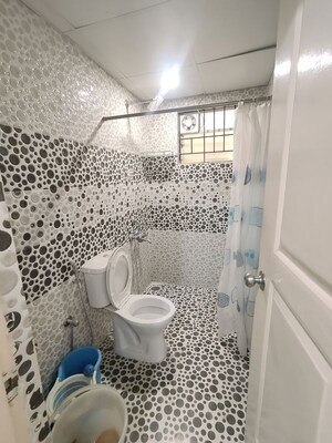 Bathroom in 3 BHK Apartment at SRS Sunrise, Parappana Agrahara – for Rent