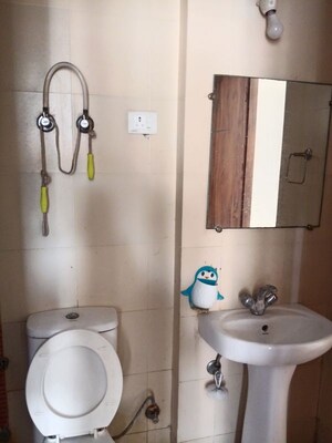 Bathroom in 3 BHK Apartment at Mahagun Mywoods, Sector 16c Greater Noida – for Rent