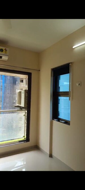 Room in 2 BHK Apartment at Asmita Sand Dunes, Malad West – for Rent