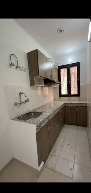 Kitchen in 2 BHK Builder Floor at Mahavir Enclave – for Sale