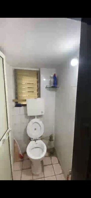 Bathroom in 2 BHK Apartment at Coronet Building, Kandivali East – for Rent