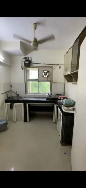 Kitchen in 2 BHK Apartment at Coronet Building, Kandivali East – for Rent