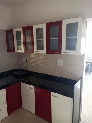 Kitchen in 2 BHK Apartment at Cosmos Jewels, Ghodbunder Road – for Rent