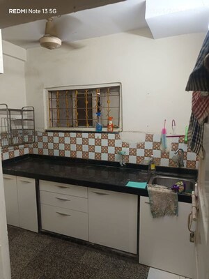 Kitchen in 1 BHK Apartment at Ganesh Tower, Naupada – for Rent