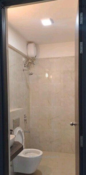 Bathroom in 2 BHK Apartment at Raymond Ten X Habitat, Pokhran Road No Two – for Rent