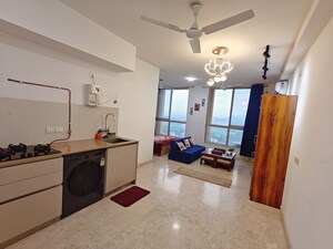 Living Room in 1 RK Apartment at Hiranandani Estate Solitaire C, Ghodbunder Road – for Rent