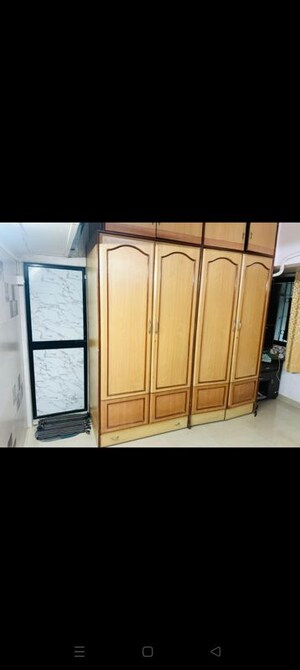 Bedroom in 2 BHK Apartment at Neelam Nagar CHS, Mulund East – for Sale