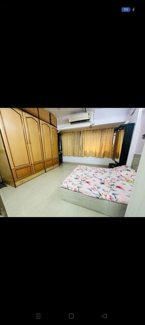 Bedroom in 2 BHK Apartment at Neelam Nagar CHS, Mulund East – for Sale