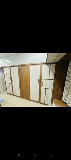 Bedroom in 2 BHK Apartment at Neelam Nagar CHS, Mulund East – for Sale