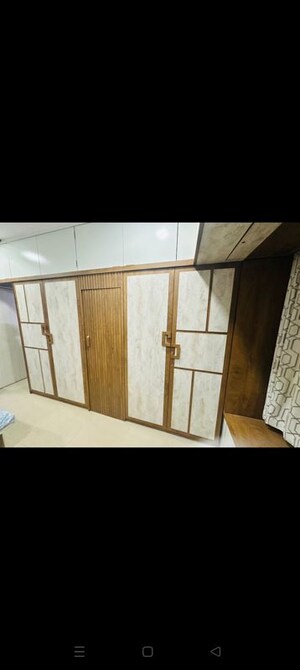Bedroom in 2 BHK Apartment at Neelam Nagar CHS, Mulund East – for Sale