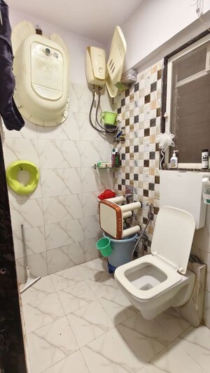 Washroom in 1 BHK Apartment at Dharti Pressidio, Kandivali West – for Sale