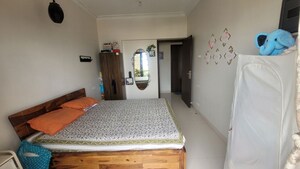 Bedroom in 2 BHK Apartment at K Raheja Heights, Malad East – for Rent