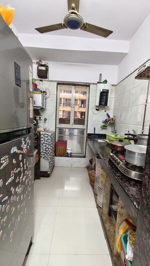 Kitchen in 1 BHK Apartment at Dharti Pressidio, Kandivali West – for Sale