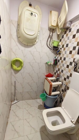 Bathroom in 1 BHK Apartment at Dharti Pressidio, Kandivali West – for Sale