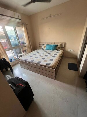 Bedroom in 1.5 BHK Apartment at Dosti West County Phase 4 Dosti Pine, Balkum Pada – for Rent