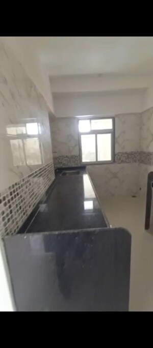 Kitchen in 2 BHK Apartment at DGS Sheetal Tapovan, Malad East – for Sale