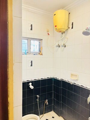 Bathroom in 2 BHK Apartment at Hal 2nd Stage – for Rent