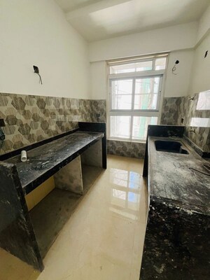 Kitchen in 1 BHK Apartment at Group Satellite Elegance, Goregaon East – for Sale