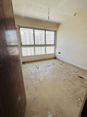 Room in 2 BHK Apartment at Group Satellite Elegance, Goregaon East – for Sale
