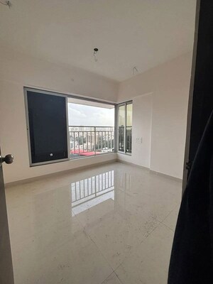 Room in 2 BHK Apartment at IM Applaud 38, Goregaon East – for Rent