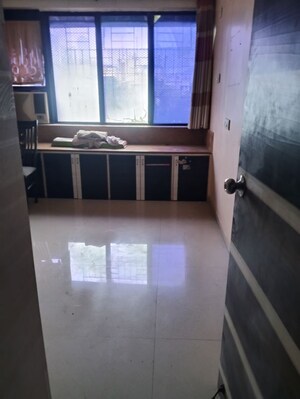 Kitchen in 2 BHK Apartment at Balrajeshwar Apartment, Mulund West – for Rent