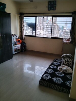 Bedroom in 1 BHK Apartment at Veena Nagar CHS, Mulund West – for Rent