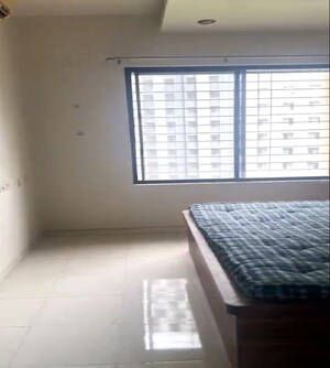 Bedroom in 3 BHK Apartment at Nagpal Dev Exotica, Kharadi – for Rent