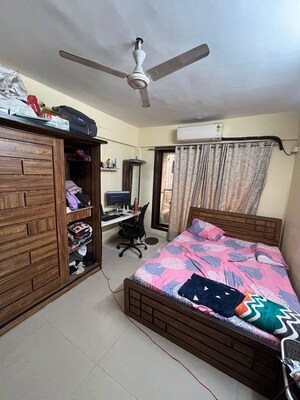 Bedroom in 2 BHK Apartment at Shree Balaji Satyam Towers, Kopar Khairane – for Rent