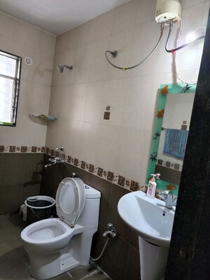 Bathroom in 3 BHK Apartment at Venkatesh Flora Phase II, Mundhwa – for Rent