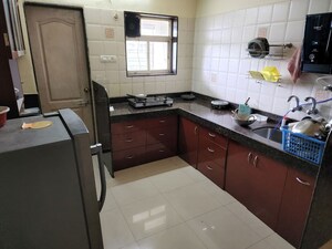 Kitchen in 3 BHK Apartment at Venkatesh Flora Phase II, Mundhwa – for Rent