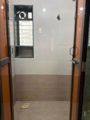 Bathroom in 1 BHK Apartment at Romell Rhythm, Malad West – for Rent