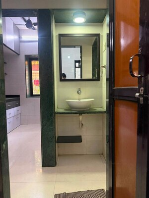 Bathroom in 1 BHK Apartment at Romell Rhythm, Malad West – for Rent