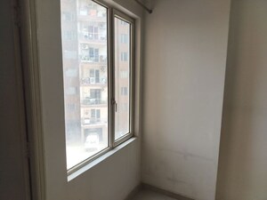 Building Lobby in 2 BHK Apartment at ROF Aalayas, Sector 102 – for Sale