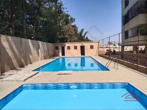 Swimming Pool in 2 BHK Apartment at Signature VR Meadows, Electronic City Phase I – for Rent